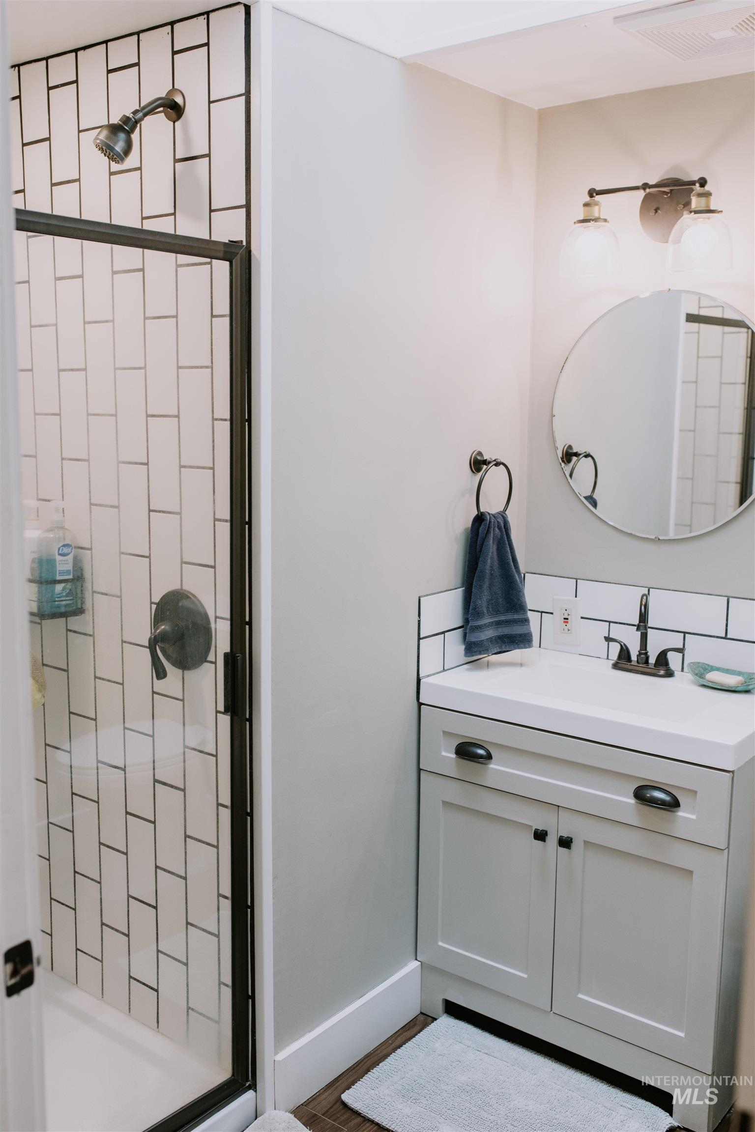 104 North Fairfield Street Council, ID 83612 - Photo 19 of 32 Full bathroom featuring a stall shower and vanity