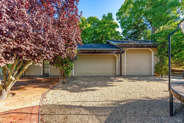 a view of a house with a street