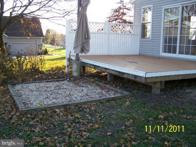 529 North Clear Ridge Road Union Bridge, MD 21791 - Photo 9 of 30 a view of a backyard with wooden fence