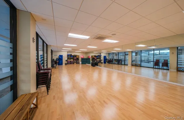 a view of a room with lots of wooden floor