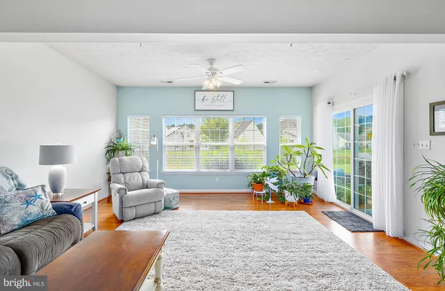 a large kitchen with stainless steel appliances granite countertop a stove and a sink
