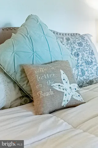 a kitchen with a table and chairs in it