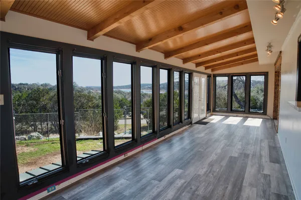 a view of entryway with wooden floor