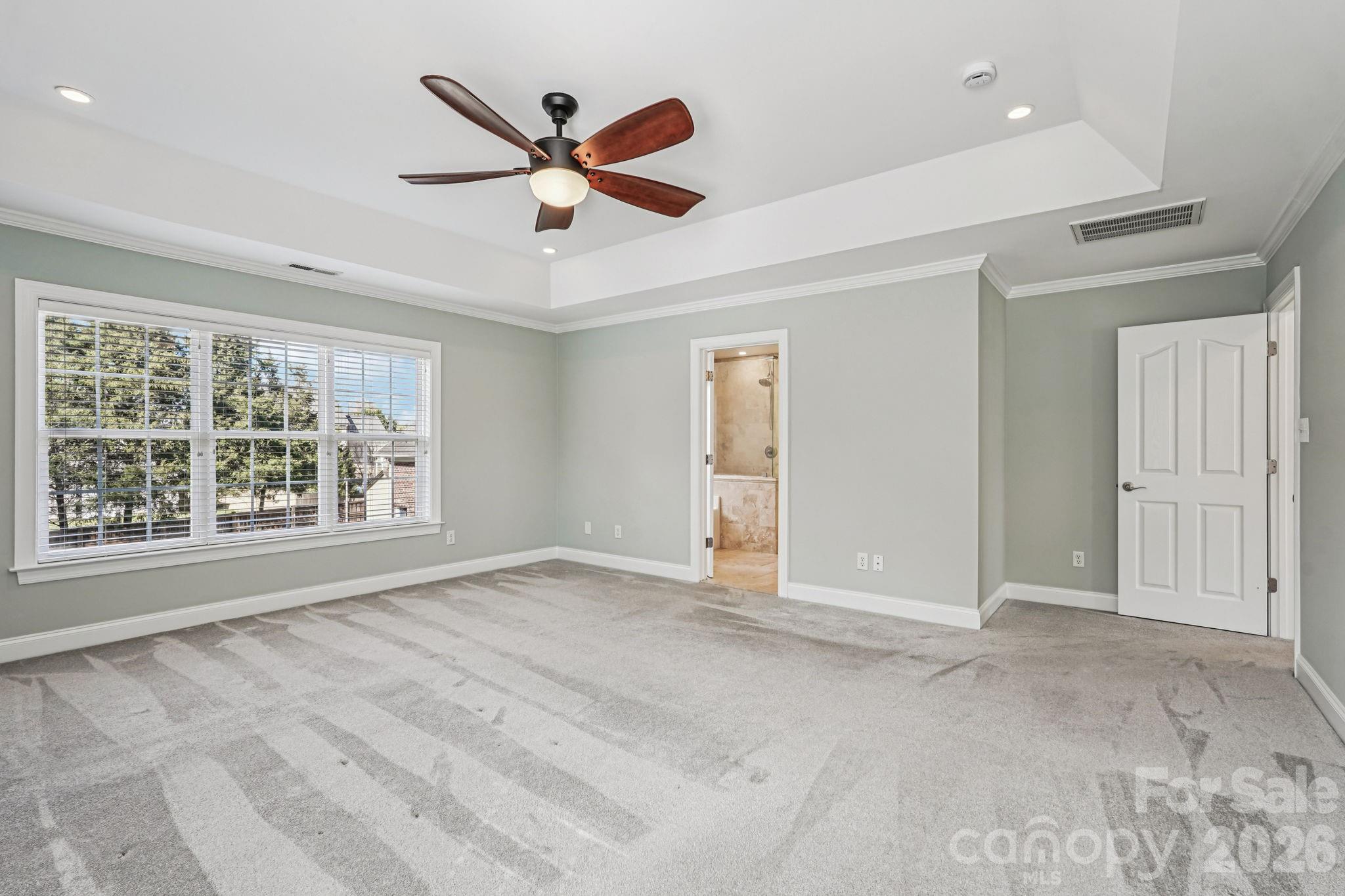 8348 Rocky River Road Harrisburg, NC 28075 - Photo 23 of 47 a view of an empty room with a window