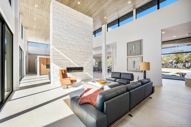 a building outdoor space with patio furniture and garden view