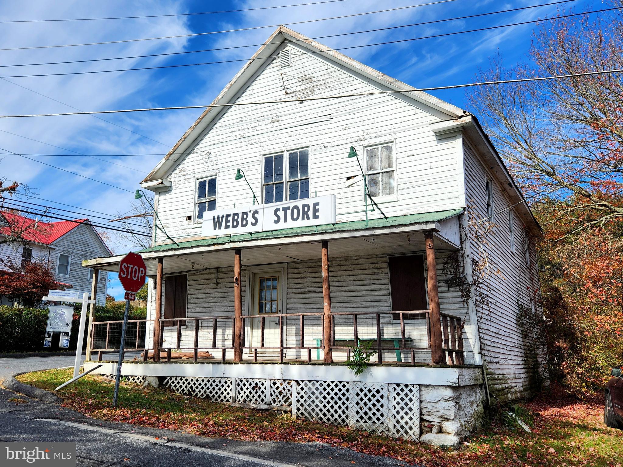 26506 Clarksburg Road Clarksburg, MD 20871 - Photo 3 of 39 a view of a white house with large windows