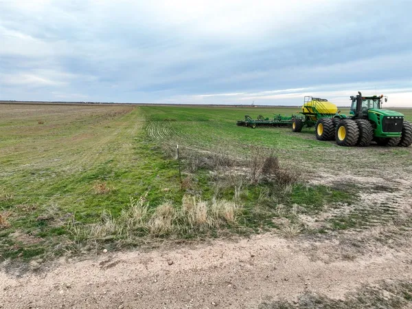 a view of a lake with lots of green space