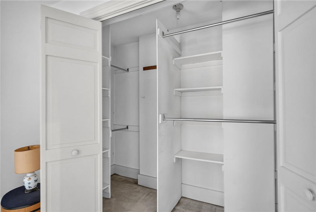 765 East Macada Road Bethlehem, PA 18017 - Photo 28 of 46 Streamlined closet system featuring multiple shelves and hanging rods offers ample storage.