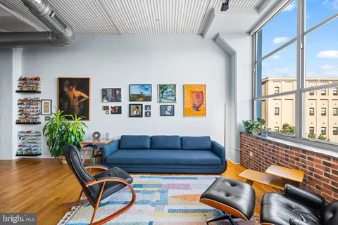 a kitchen with stainless steel appliances granite countertop a stove and cabinets