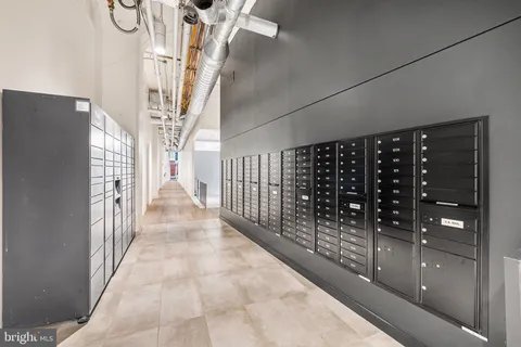 a view of a garden with a building in the background