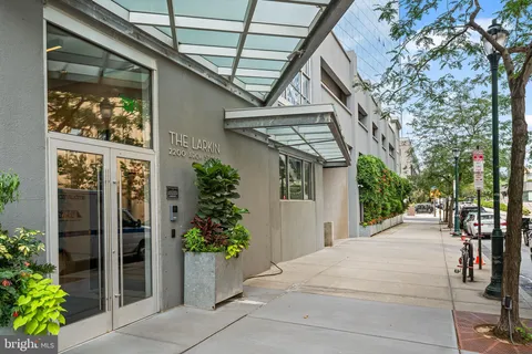 a view of a porch with potted plants