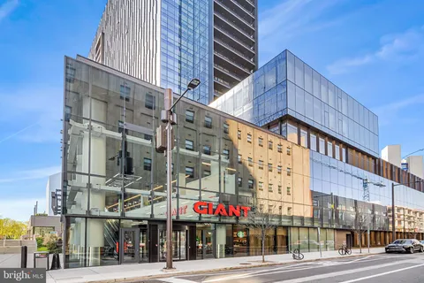 a cafe on the corner of the building
