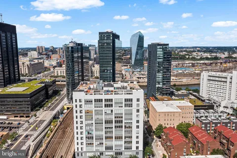 a view of city with tall buildings