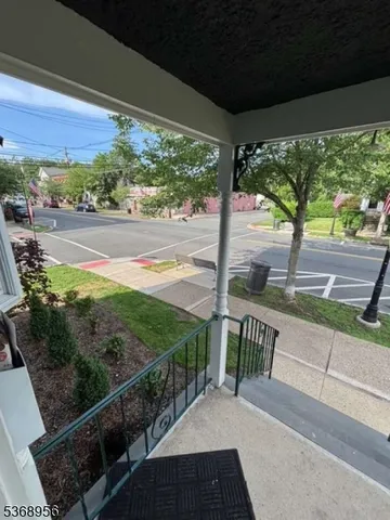 a view of balcony with furniture