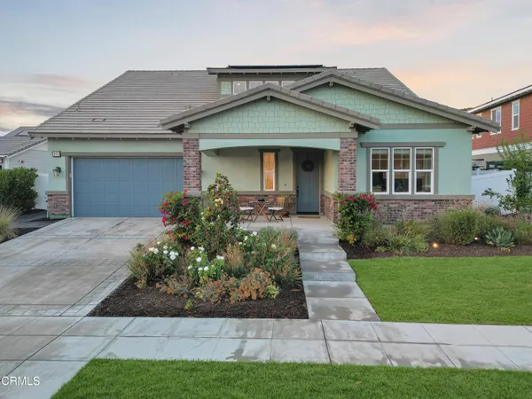 front view of a house and a yard