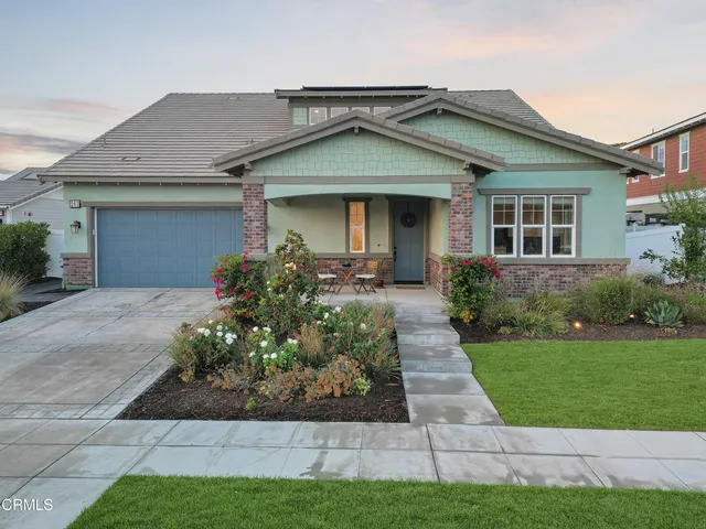 front view of a house and a yard