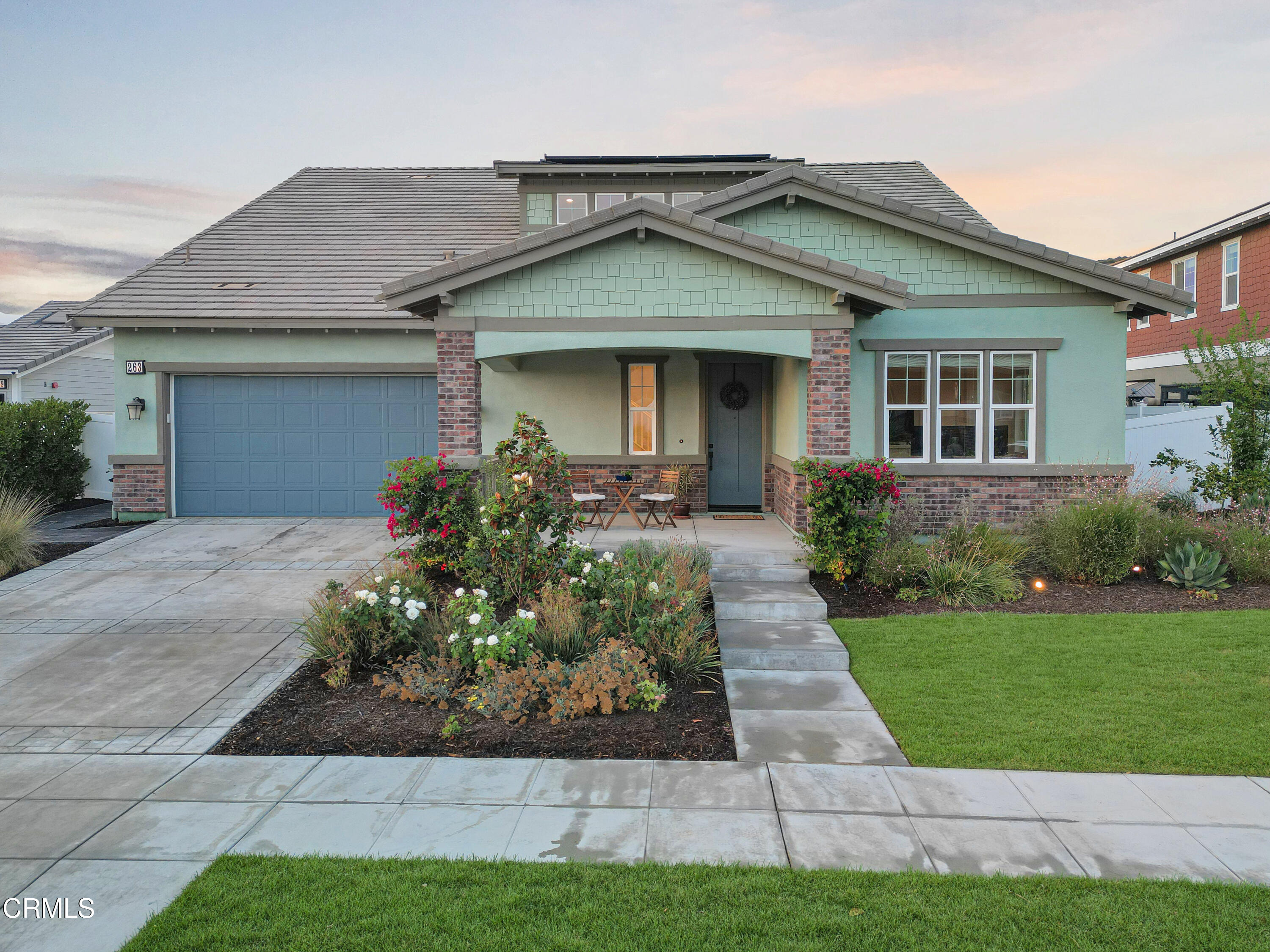 front view of a house and a yard