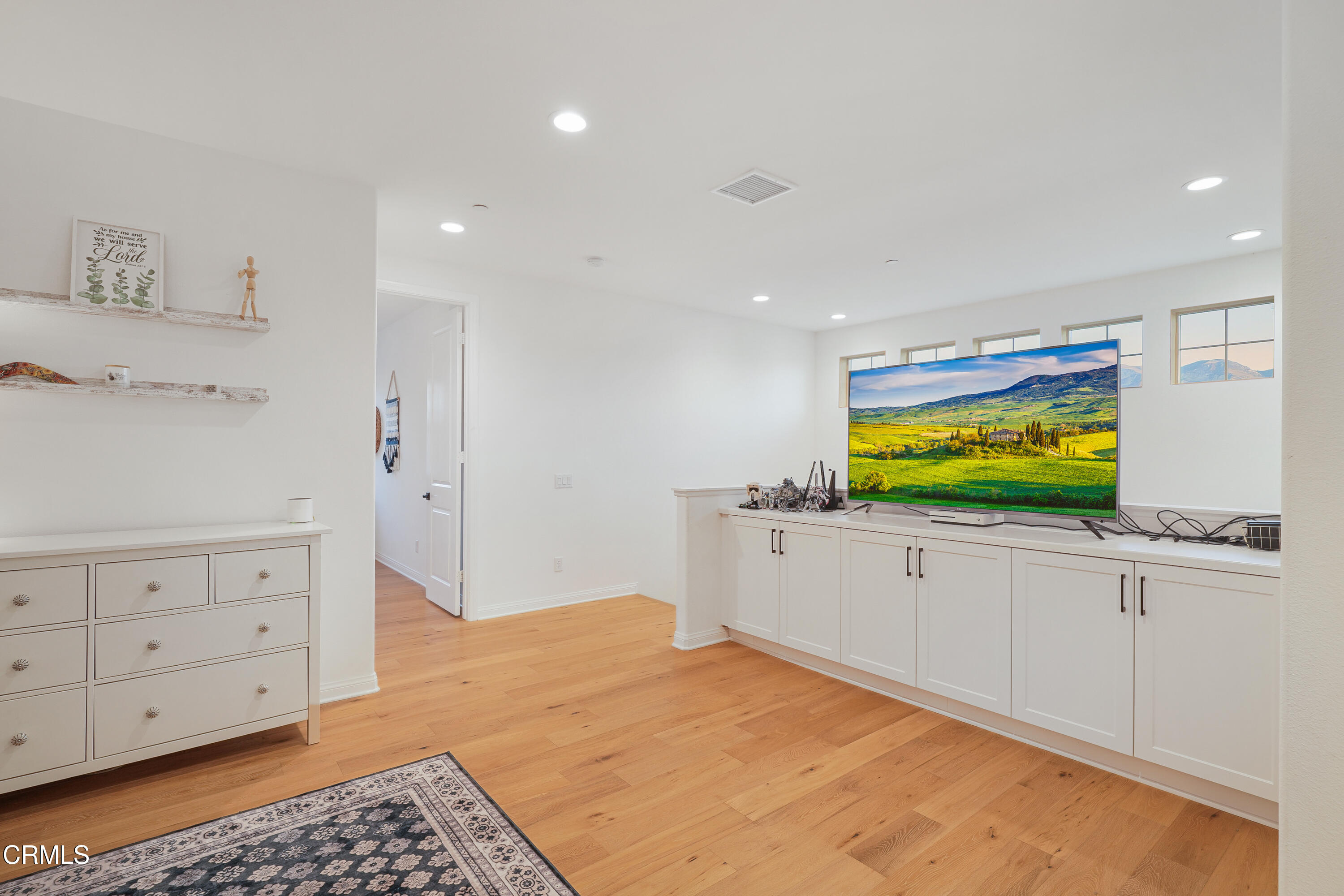263 Wisteria Street Fillmore, CA 93015 - Photo 17 of 51 a bedroom with a bed and a flat screen tv