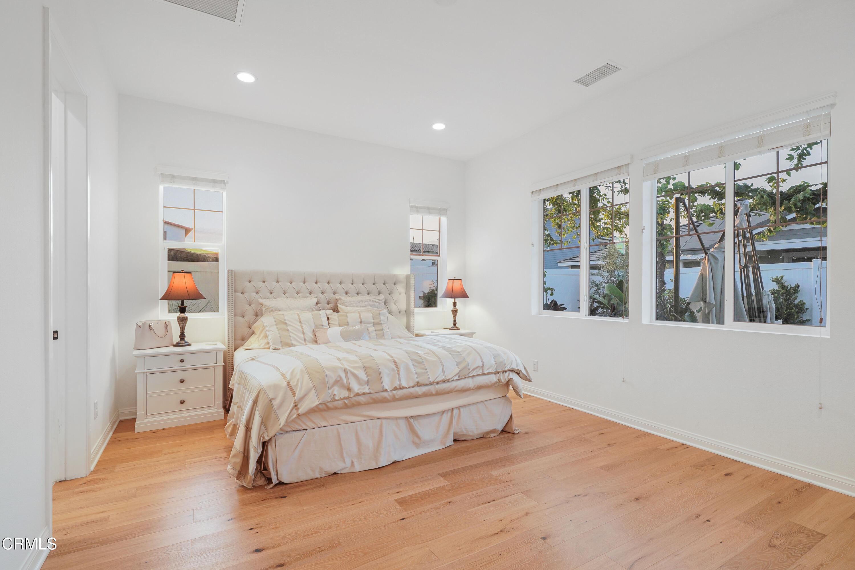 263 Wisteria Street Fillmore, CA 93015 - Photo 31 of 51 a spacious bedroom with a bed and a large window