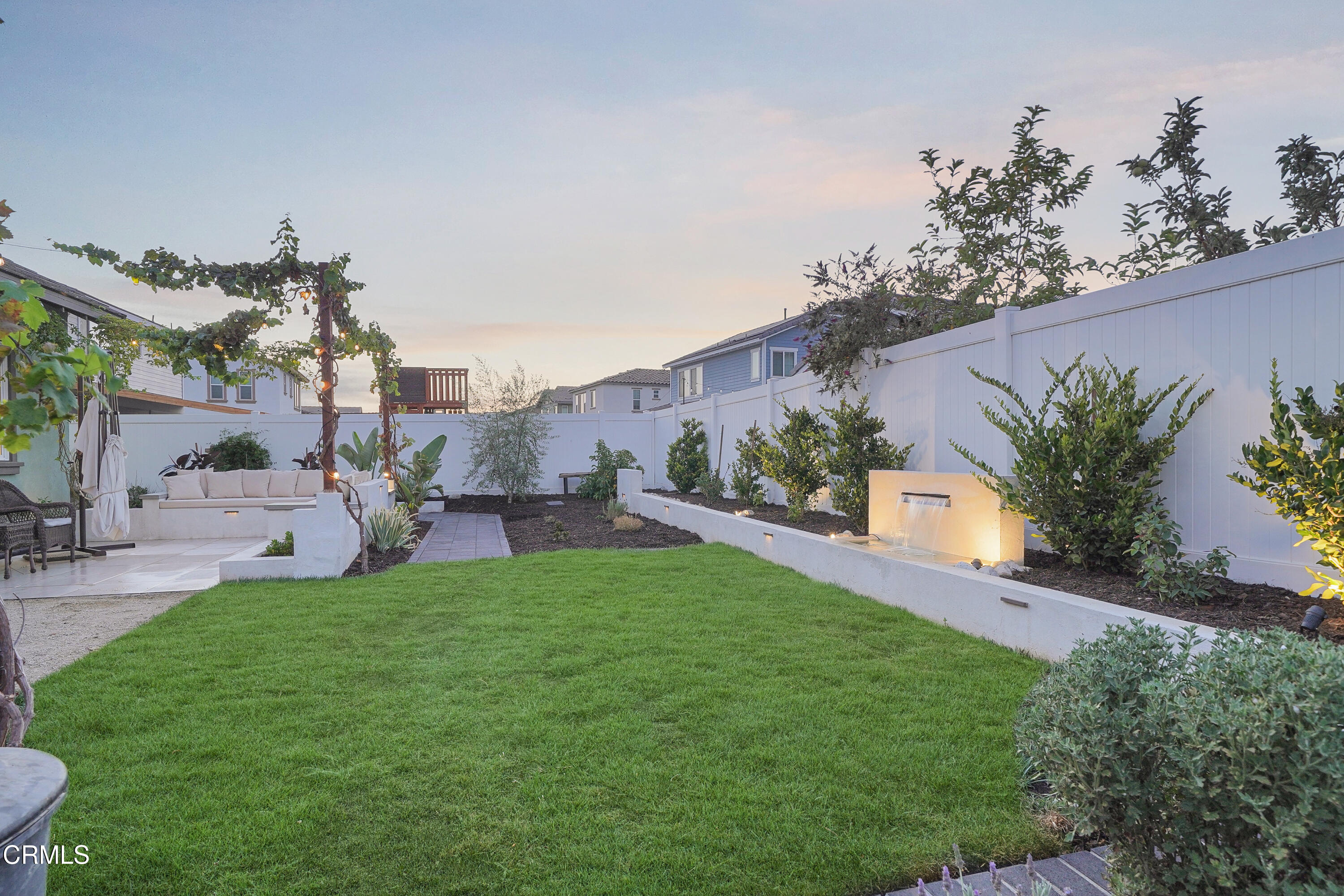 263 Wisteria Street Fillmore, CA 93015 - Photo 39 of 51 a view of a house with a yard and a patio