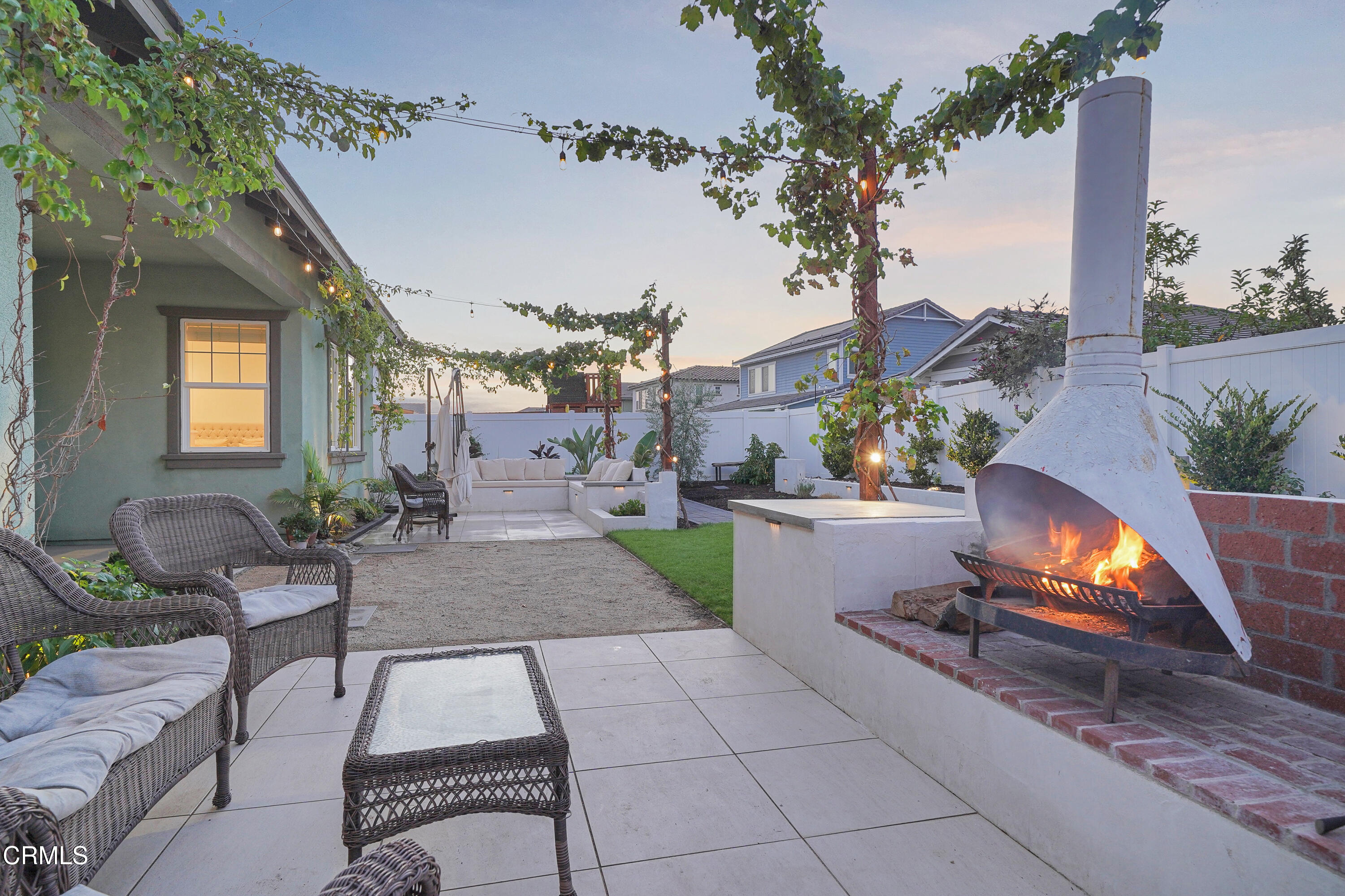 263 Wisteria Street Fillmore, CA 93015 - Photo 42 of 51 a view of a chairs and table in the patio