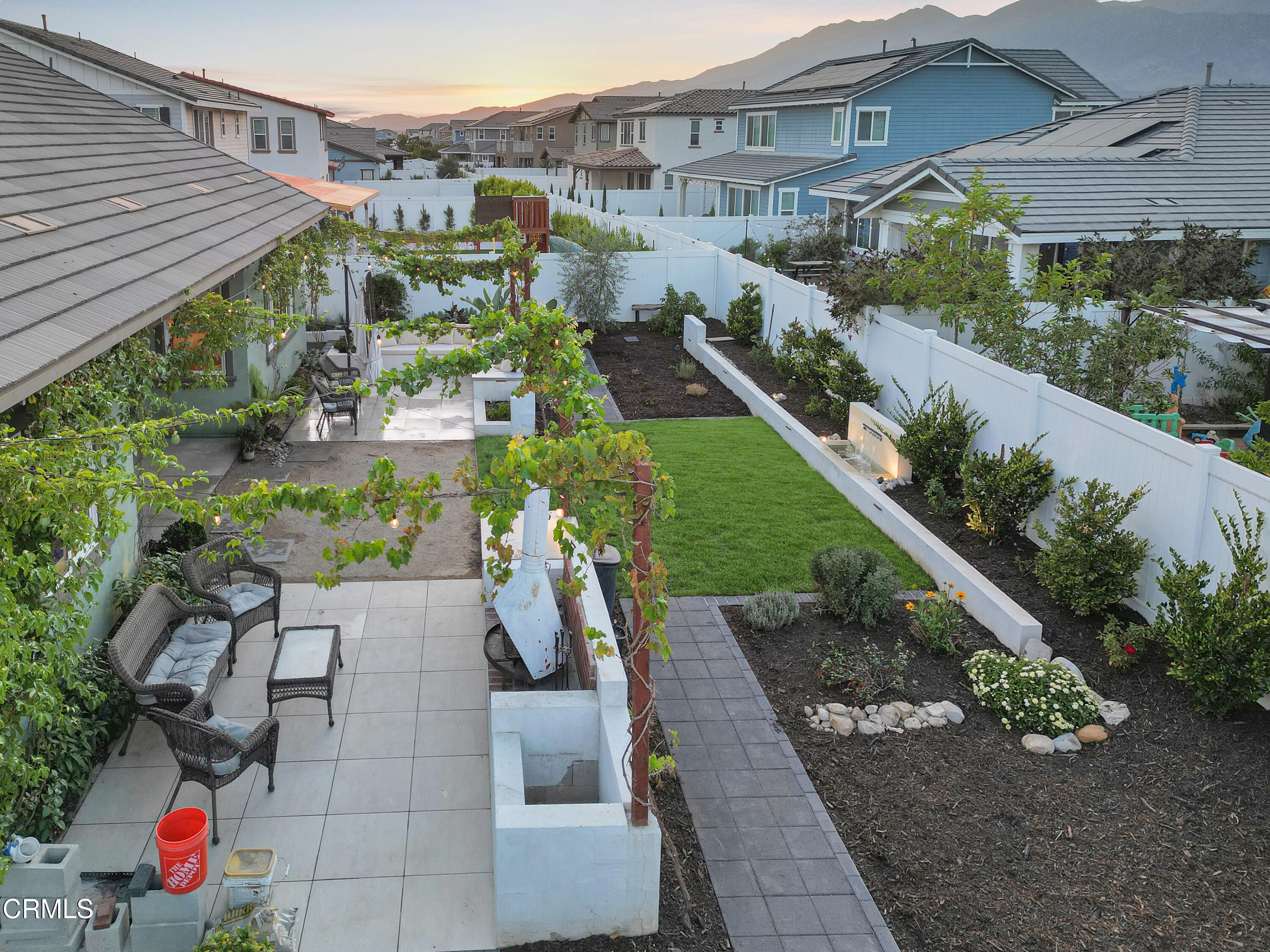 263 Wisteria Street Fillmore, CA 93015 - Photo 49 of 51 a view of a garden with an outdoor seating