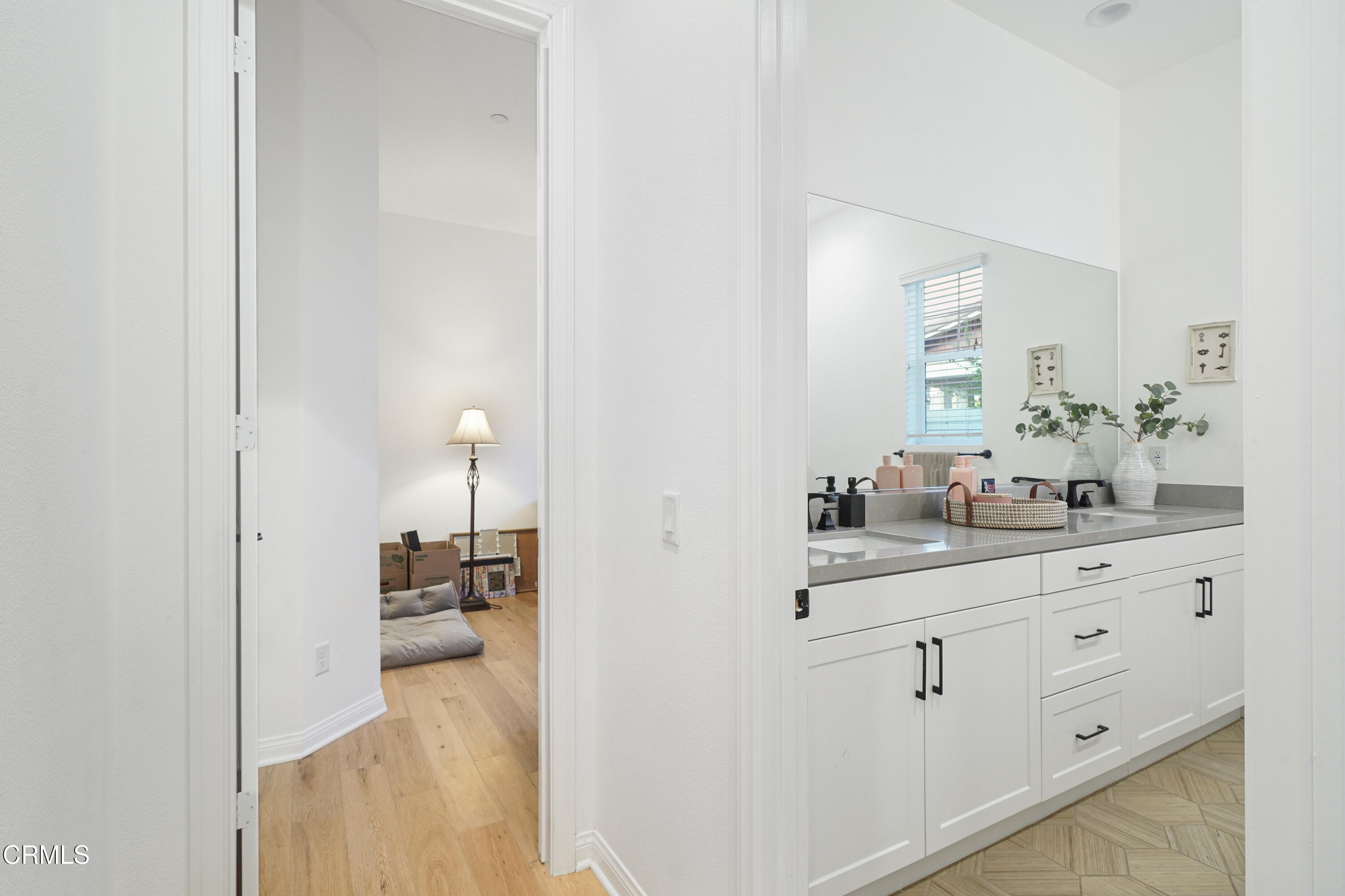 263 Wisteria Street Fillmore, CA 93015 - Photo 9 of 51 a bathroom with a sink and a mirror