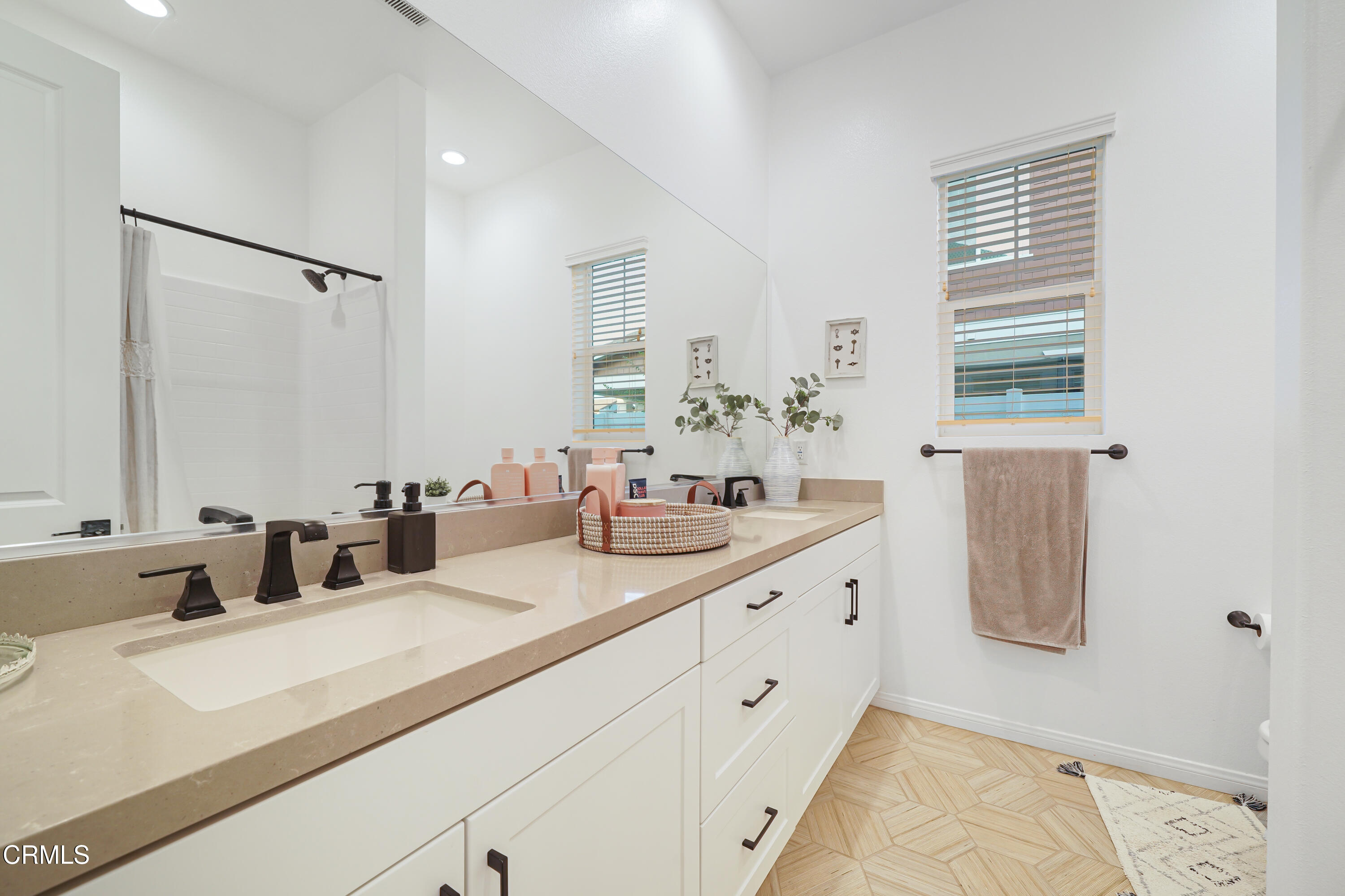 263 Wisteria Street Fillmore, CA 93015 - Photo 10 of 51 a bathroom with double vanity and a mirror
