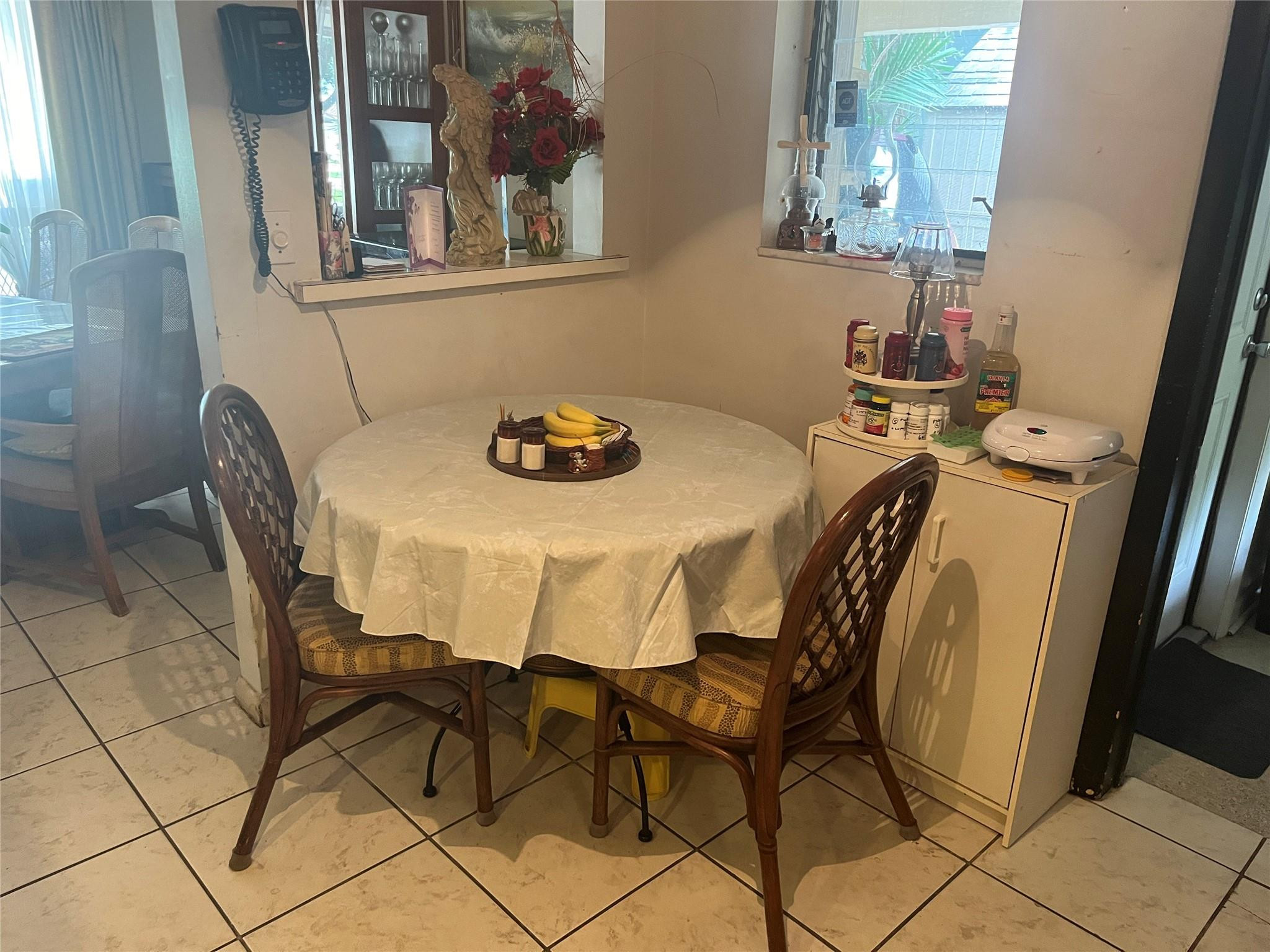 3401 West Park Road Hollywood, FL 33021 - Photo 21 of 28 a view of a dining room with furniture and chandelier
