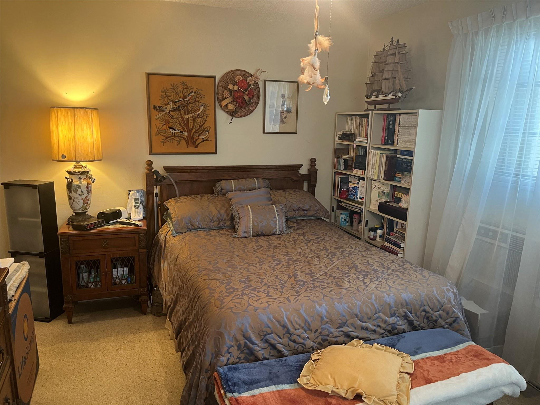 3401 West Park Road Hollywood, FL 33021 - Photo 10 of 28 a bedroom with a bed and a bookshelf