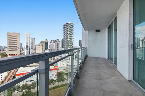 a view of a city from a balcony
