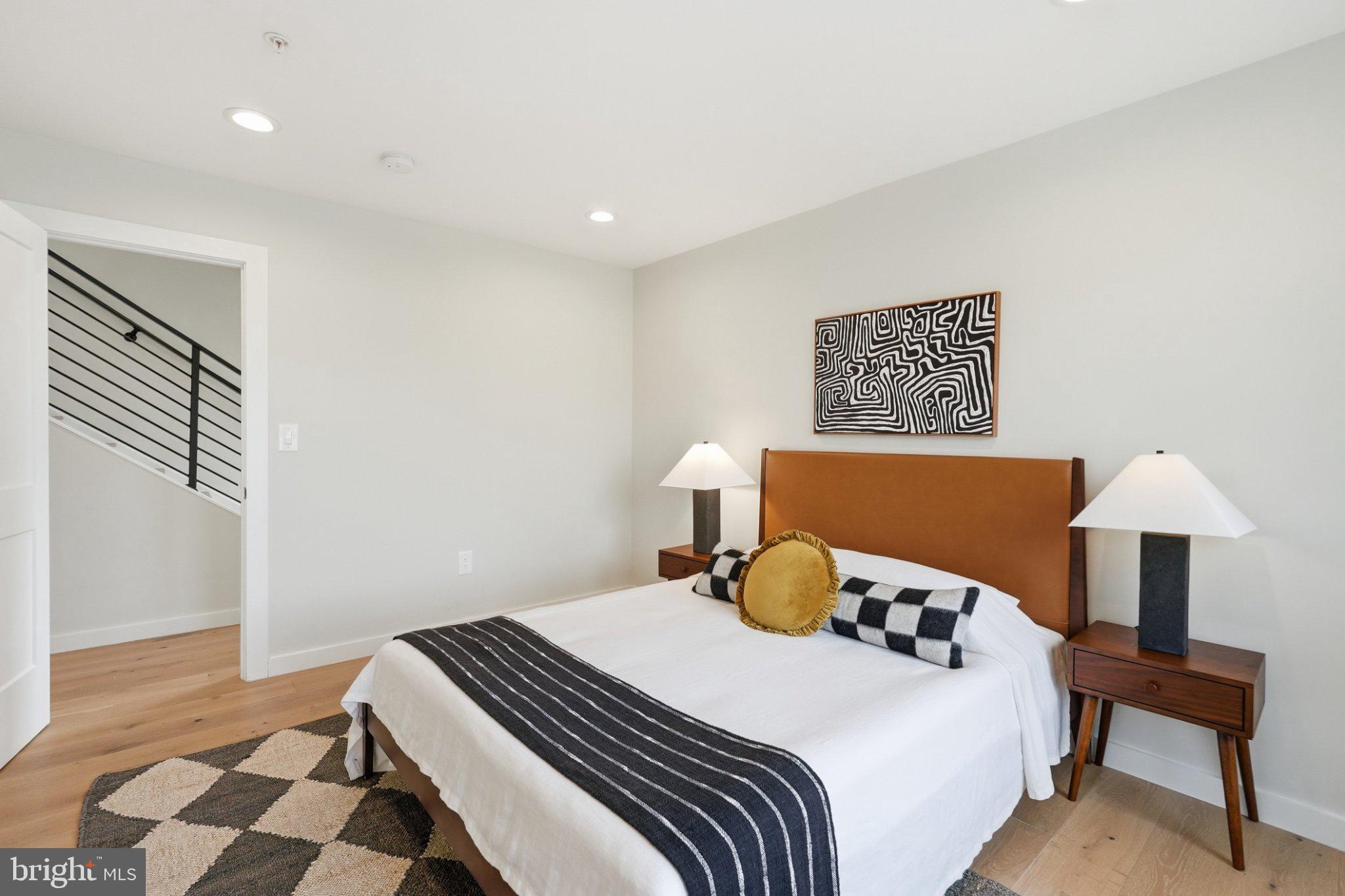 3922 3rd Street Northwest, Unit 2 Washington, DC 20011 - Photo 25 of 40 Modern serenity in a cozy bedroom.