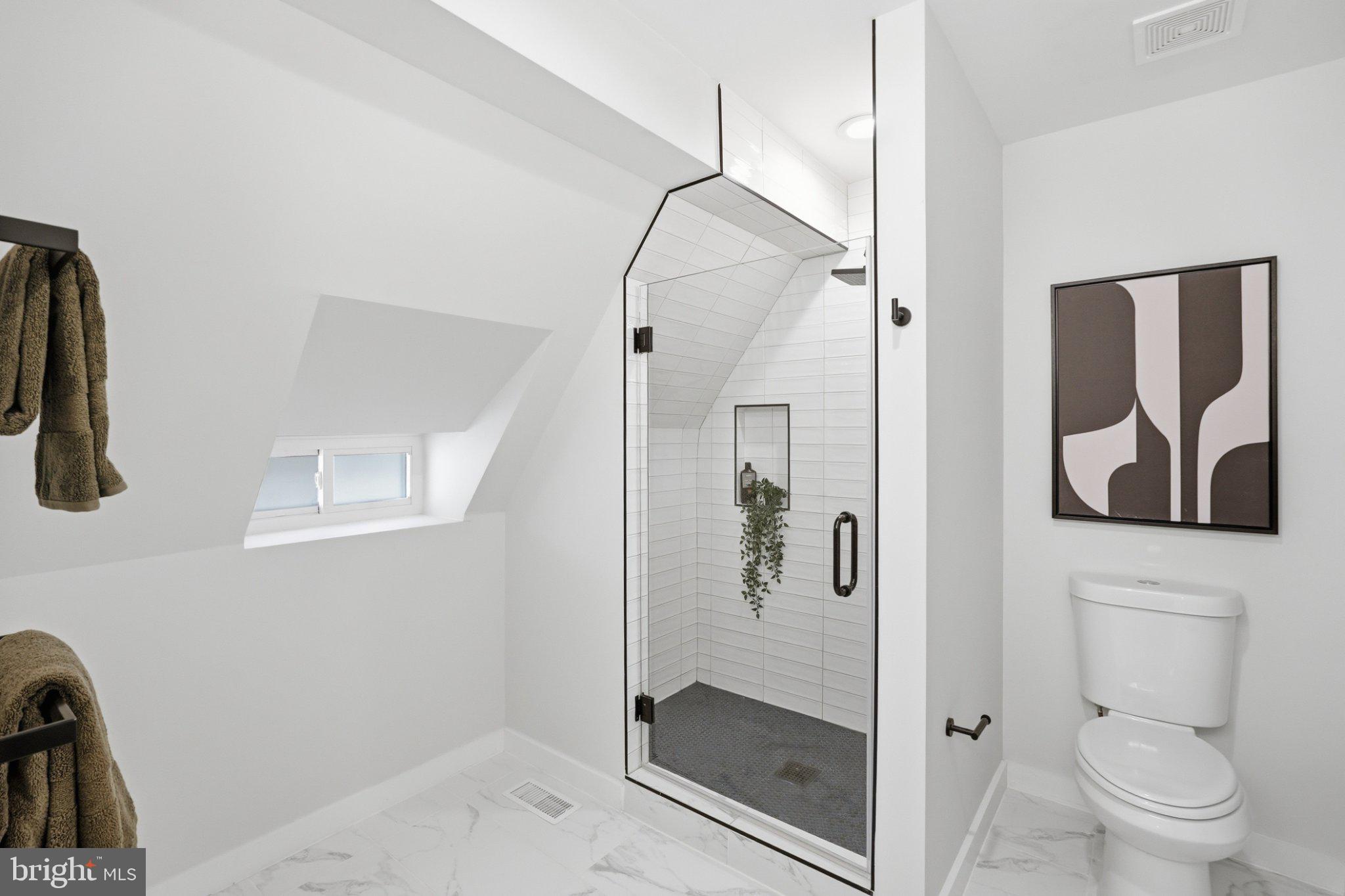 3922 3rd Street Northwest, Unit 2 Washington, DC 20011 - Photo 32 of 40 Sleek modern bathroom with unique design.