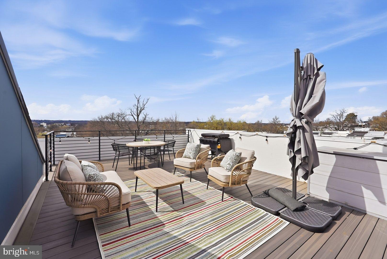 3922 3rd Street Northwest, Unit 2 Washington, DC 20011 - Photo 35 of 40 Sunny rooftop retreat with scenic views.