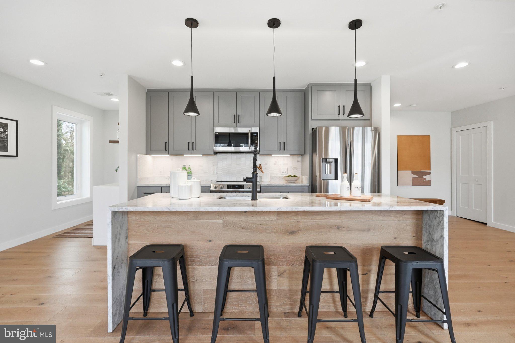 3922 3rd Street Northwest, Unit 2 Washington, DC 20011 - Photo 6 of 40 Sleek kitchen with modern elegance.