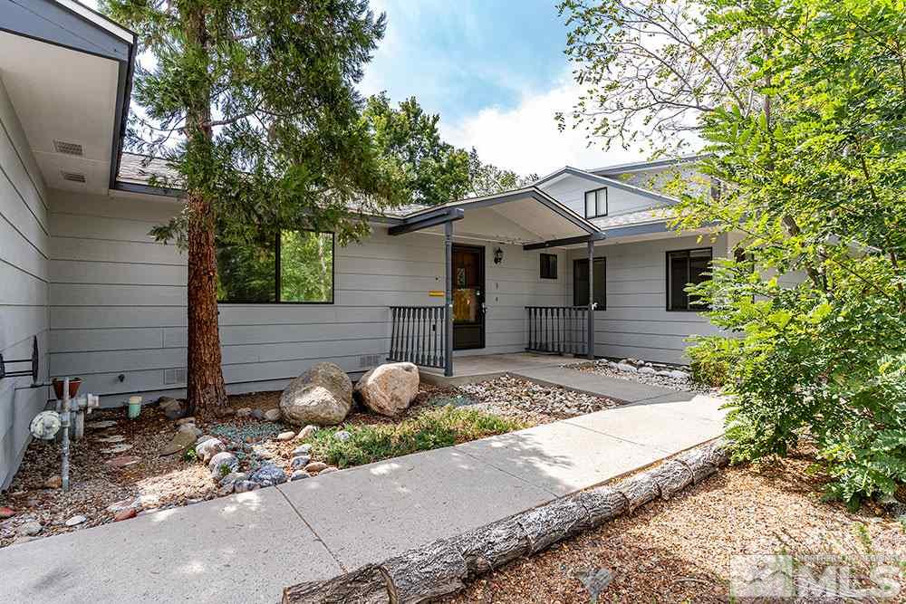 3090 Knight Road Reno, NV 89509 - Photo 2 of 31 a front view of a house with garden