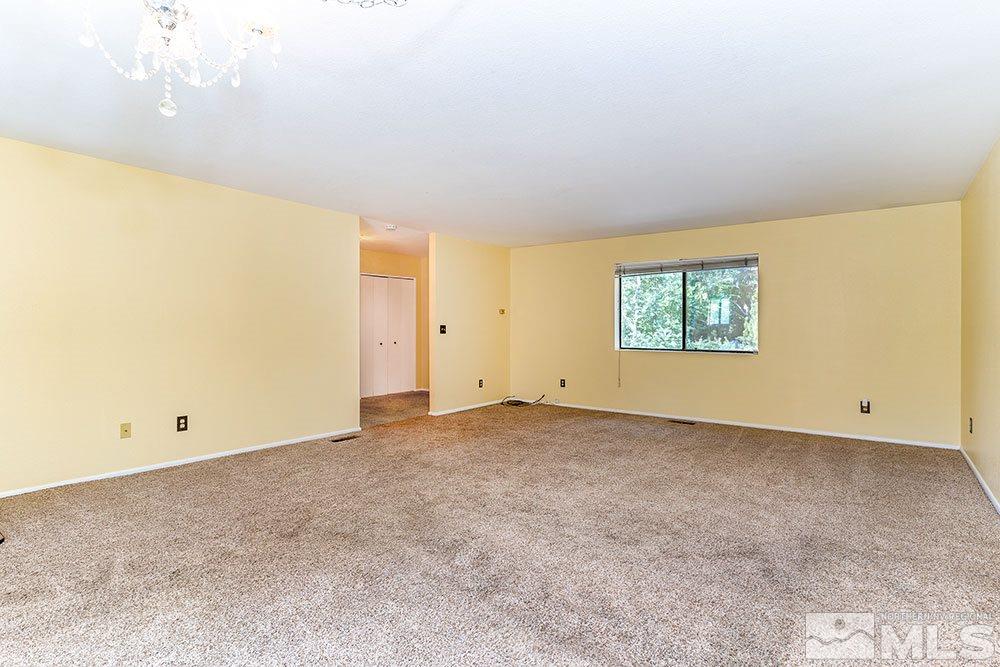 3090 Knight Road Reno, NV 89509 - Photo 6 of 31 a view of an empty room with a window