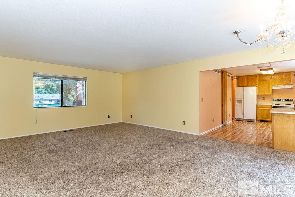 3090 Knight Road Reno, NV 89509 - Photo 7 of 31 a view of an empty room with a window