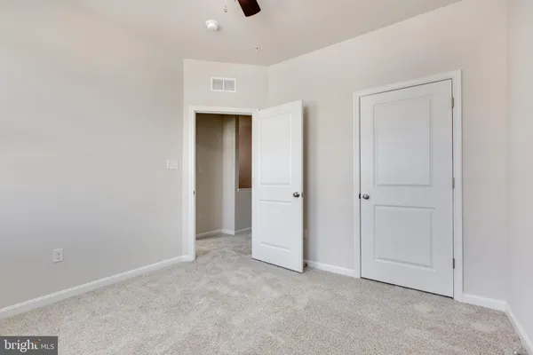 en empty room with windows