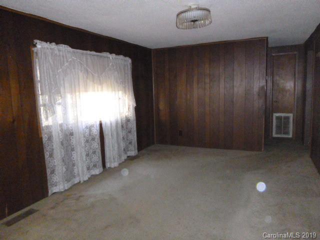 6506 Helms And Belk Road Monroe, NC 28110 - Photo 8 of 16 an empty room with windows