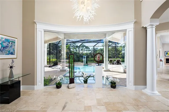 a view of a livingroom with porch and furniture