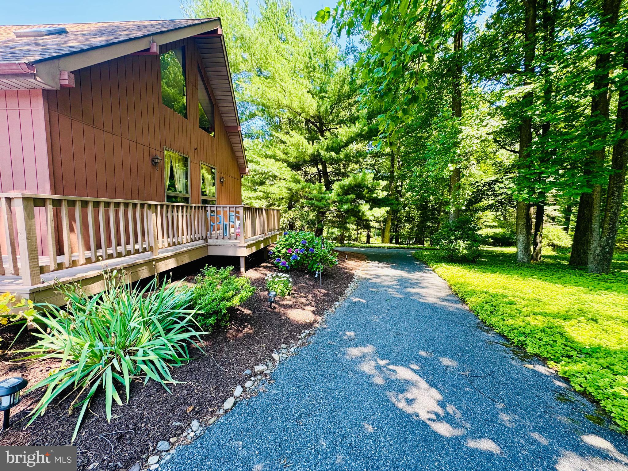 523 Texter Mountain Road Robesonia, PA 19551 - Photo 15 of 81 Exterior front wrap around deck
