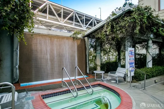a view of backyard with a patio and outdoor seating