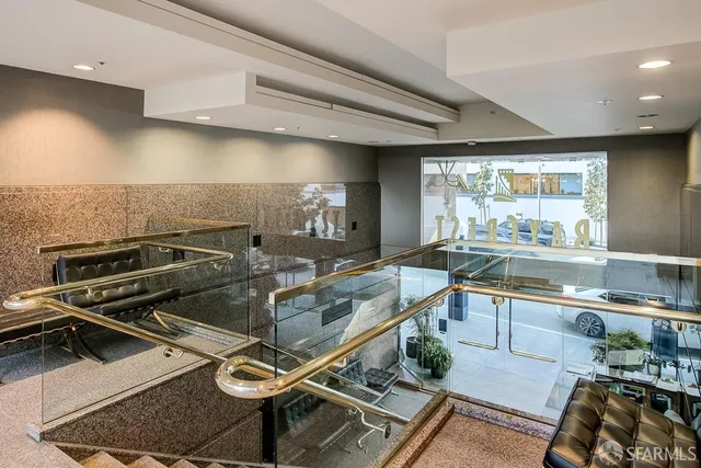 a kitchen with a table chairs stove and cabinets