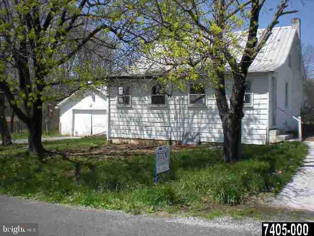 197 Wenschoff Road Fairfield, PA 17320 - Photo 1 of 2 a front view of a house with garden