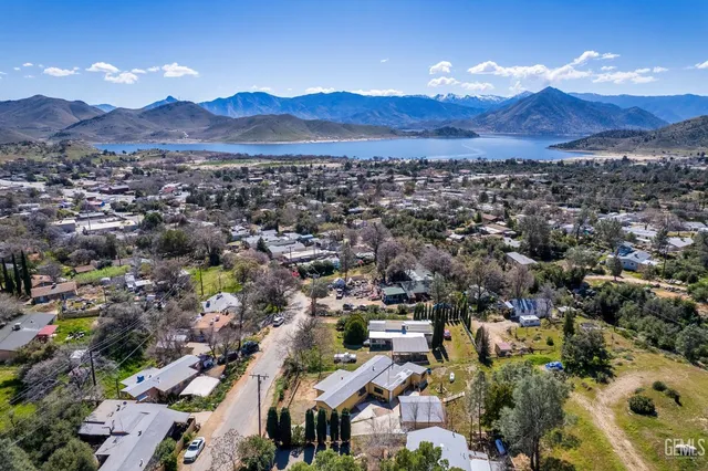 an aerial view of residential house and outdoor space