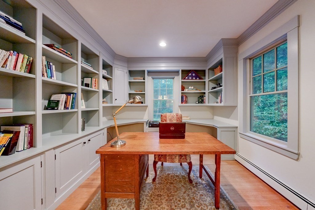 17 Broken Tree Road Medway, MA 02053 - Photo 16 of 40 a view of a workspace with furniture and a bookshelf