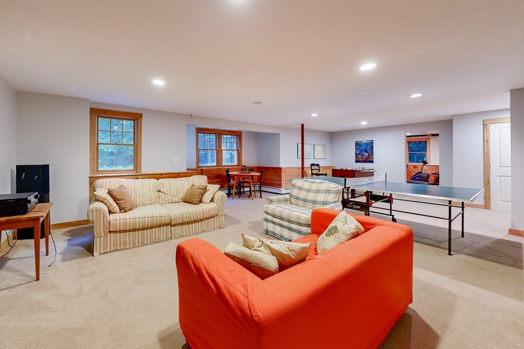 17 Broken Tree Road Medway, MA 02053 - Photo 36 of 40 a living room with furniture kitchen view and a wooden floor
