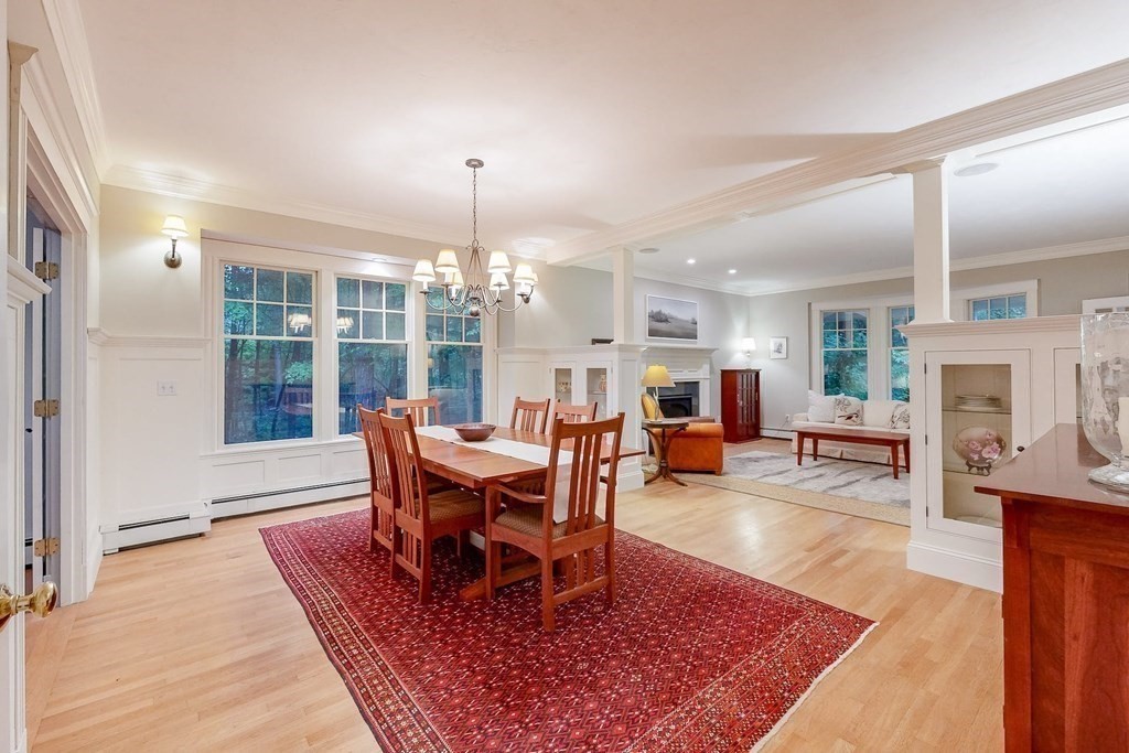17 Broken Tree Road Medway, MA 02053 - Photo 5 of 40 a living room with furniture a fireplace and a dining table with wooden floor