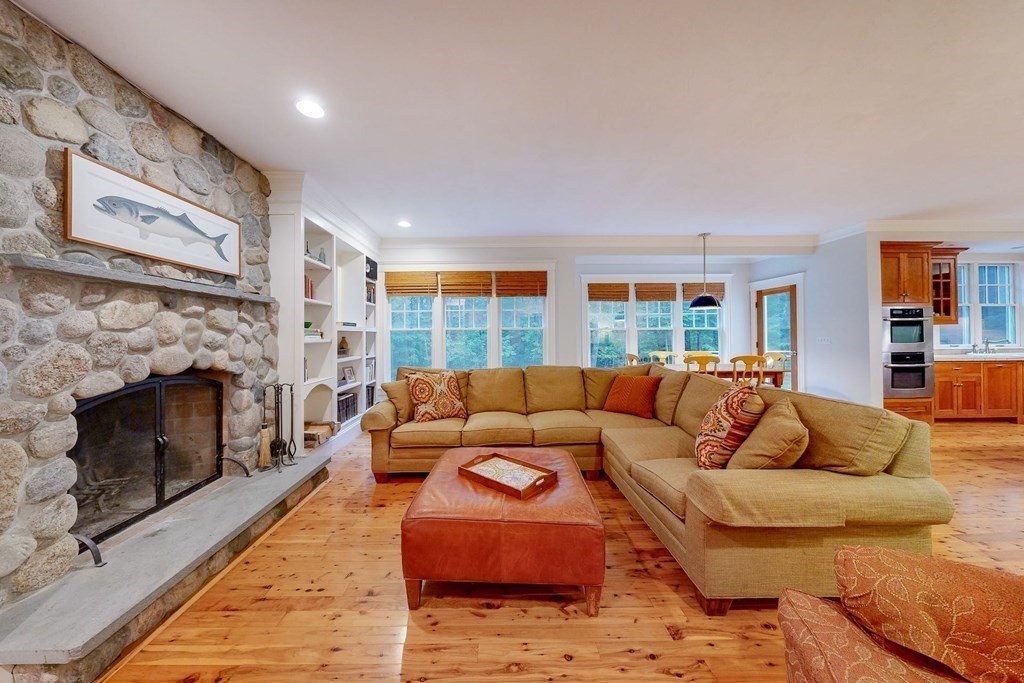 17 Broken Tree Road Medway, MA 02053 - Photo 7 of 40 a living room with furniture and a fireplace
